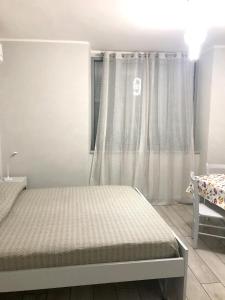 One bedroom apartement with wifi at Napoliにあるベッド