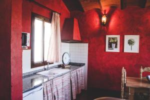 A television and/or entertainment centre at Cosy house in Estepa with mountain view