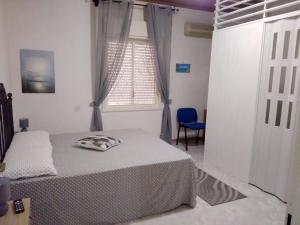 Een bed of bedden in een kamer bij 2 bedrooms apartement at Mazara del Vallo 800 m away from the beach with city view and wifi
