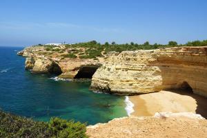 a view of a rocky shoreline with the ocean at Elegant Villa in Albufeira with Private Pool. in Albufeira