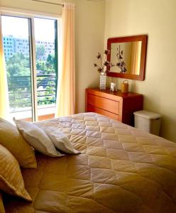 Un ou plusieurs lits dans un hébergement de l'établissement 2 bedrooms apartement with wifi at Funchal 2 km away from the beach