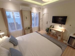 TV a/nebo společenská místnost v ubytování Double Bed Hotel