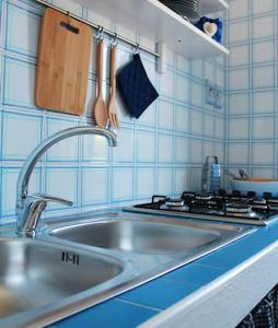 Η κουζίνα ή μικρή κουζίνα στο Charming house with garden in Monopoli with direct access to the beach
