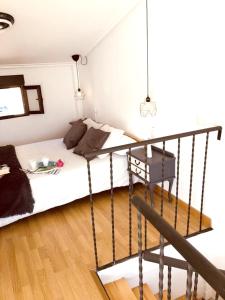מיטה או מיטות בחדר ב-3 bedrooms house with furnished terrace and wifi at Viguera