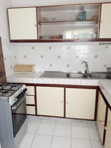 Η κουζίνα ή μικρή κουζίνα στο Seaview Apartment in Flic en Flac - 60 m² with Balcony