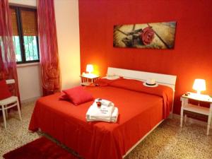 Letto o letti in una camera di 2 bedrooms house with enclosed garden and wifi at Melissano