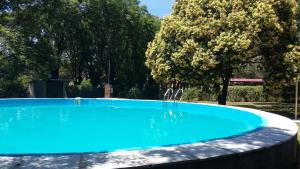 Bazén v ubytování Mariapolis Alta Gracia nebo v jeho okolí