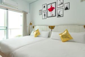 Postel nebo postele na pokoji v ubytování W Homestay