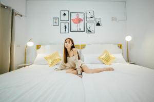 Letto o letti in una camera di W Homestay