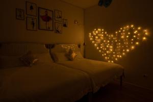 Letto o letti in una camera di W Homestay