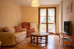 Telewizja i/lub zestaw kina domowego w obiekcie Apartamentos Onki Xin