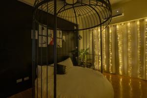 Letto o letti in una camera di W Homestay