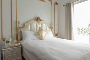 Letto o letti in una camera di W Homestay