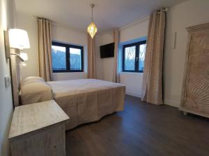 Postel nebo postele na pokoji v ubytování VILLA MAREL