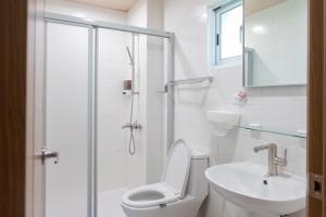 Koupelna v ubytování W Homestay + 18 fotografií