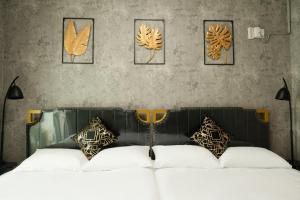 Letto o letti in una camera di W Homestay