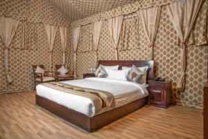 Gulta vai gultas numurā naktsmītnē Echor - The Koti Village Resort Kufri