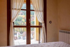 Łóżko lub łóżka w pokoju w obiekcie Apartamentos Onki Xin
