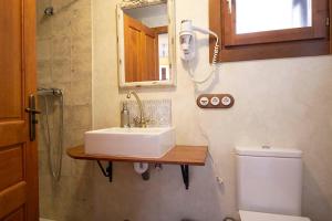 Łazienka w obiekcie Apartamentos Onki Xin