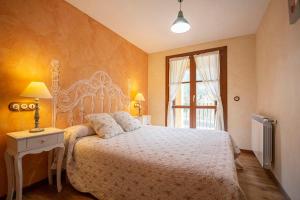 Łóżko lub łóżka w pokoju w obiekcie Apartamentos Onki Xin