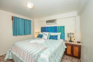 Postel nebo postele na pokoji v ubytování Bella Vista Resort Belize