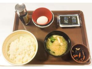 a tray with rice and bowls of food on it at Urbanty Nishikujo - Vacation STAY 08577v in Osaka +3 photos