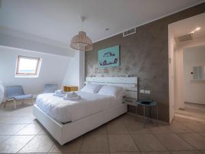 Posteľ alebo postele v izbe v ubytovaní Hotel Jolly Roger