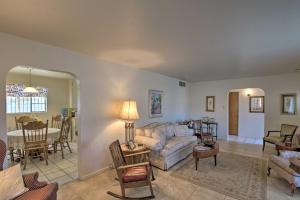 a living room with a couch and a table at Central Phoenix Home Less Than 3 Mi to Downtown! in Phoenix