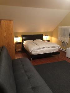 Postel nebo postele na pokoji v ubytování Crowsnest Vineyards Guesthouse