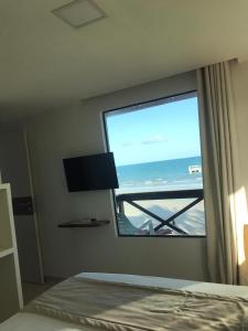 Pousada Grandmar, Maragogi客房内的一张或多张床位