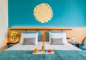 Rúm í herbergi á Hotel Nestos