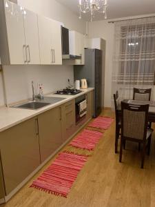A kitchen or kitchenette at Апартаменти у серці Львова