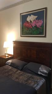 A bed or beds in a room at Piso romantico y espacioso