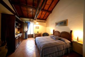 Postel nebo postele na pokoji v ubytování Agriturismo Monte Valentino