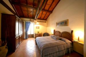 Postel nebo postele na pokoji v ubytování Agriturismo Monte Valentino