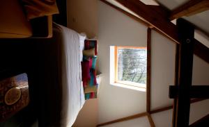 Palanda nebo palandy na pokoji v ubytování B&B Hippo-Droom