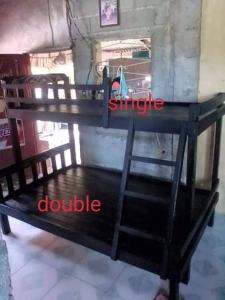 Postel nebo postele na pokoji v ubytování CVBNB BAGUIO GUESTHOUSE + 2 fotografie