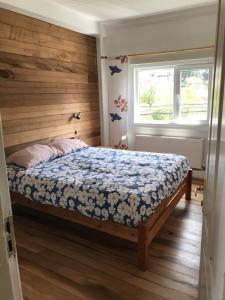 Postel nebo postele na pokoji v ubytování Hostal Compass del Sur