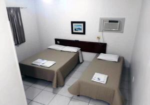 Postel nebo postele na pokoji v ubytování Hotel Fratelli + 13 fotografií