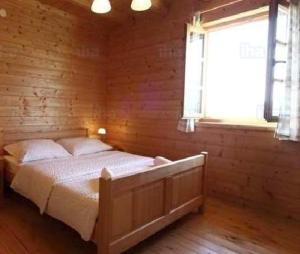 Postel nebo postele na pokoji v ubytování Maruti Villa
