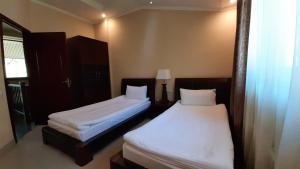 Katil atau katil-katil dalam bilik di Dilijan Villa 12