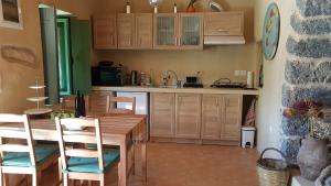 A kitchen or kitchenette at Sitanos Athena House