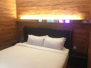 Voodi või voodid majutusasutuse Hermess Hotel Johor toas