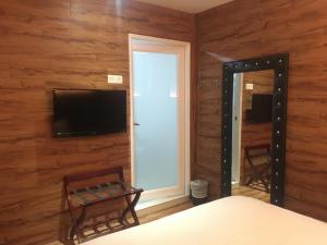 Televiisor ja/või meelelahutuskeskus majutusasutuses Hermess Hotel Johor