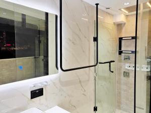 Kylpyhuone majoituspaikassa Inotel Suite