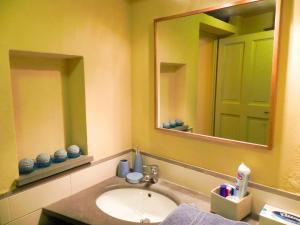 a bathroom with a sink and a large mirror at La Casa Di Cocca in Alba +32 photos