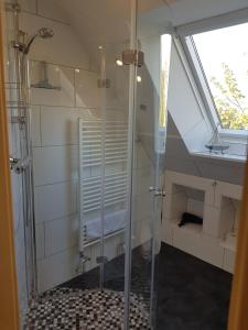 Koupelna v ubytování Ferienhaus Wind + 14 fotografií