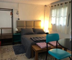 A bed or beds in a room at Vivenda dos Guaranys - uma imersão na natureza - Loft