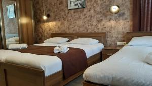 Letto o letti in una camera di Balu