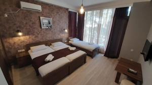 Letto o letti in una camera di Balu